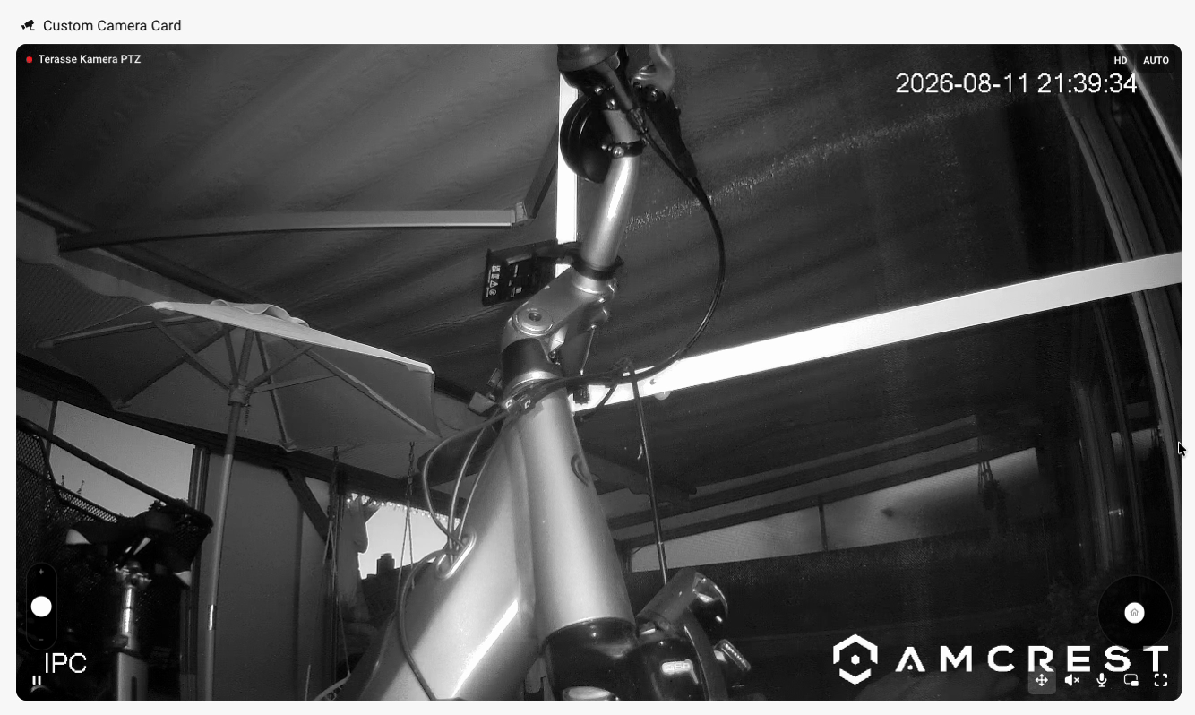camera.ui card with the PTZ overlay showing a zoom slider and a pan and tilt pad